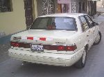 صورة فوتوغرافية 4 سيارة Mercury Topaz سيدان (1 جيل [2 تصفيف] 1988 1994)